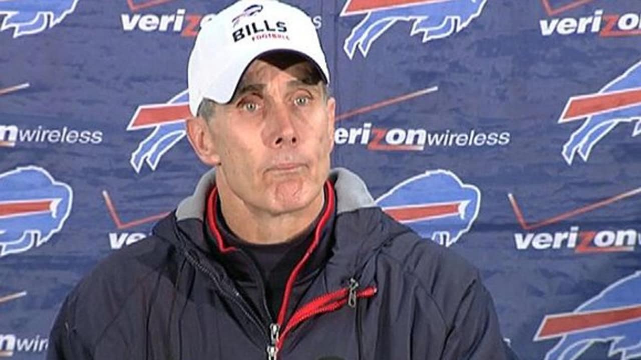 Buffalo Bills head coach Dick Jauron, center, watches a replay on