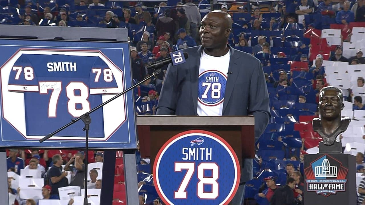 Buffalo Bills' Hall of Famer Bruce Smith speaks after his jersey number was  retired during half-time an NFL football game between the Buffalo Bills and  the New York Jets on Thursday, Sept.