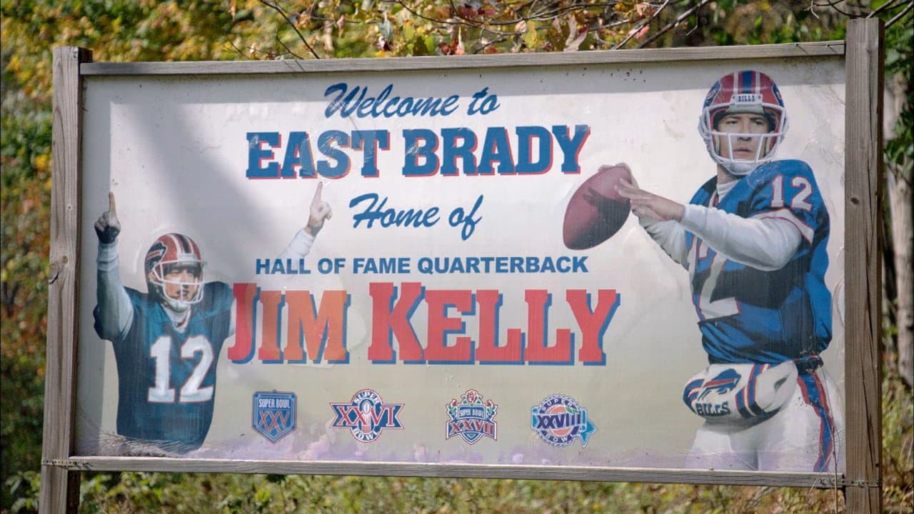 Jim Kelly returns to Western Pa. school to share message of inspiration,  present golden football