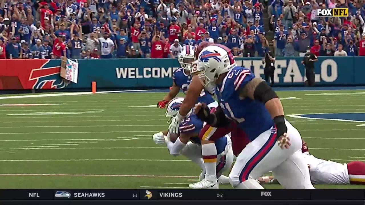 Washington Football Team's Taylor Heinicke scores with a beer