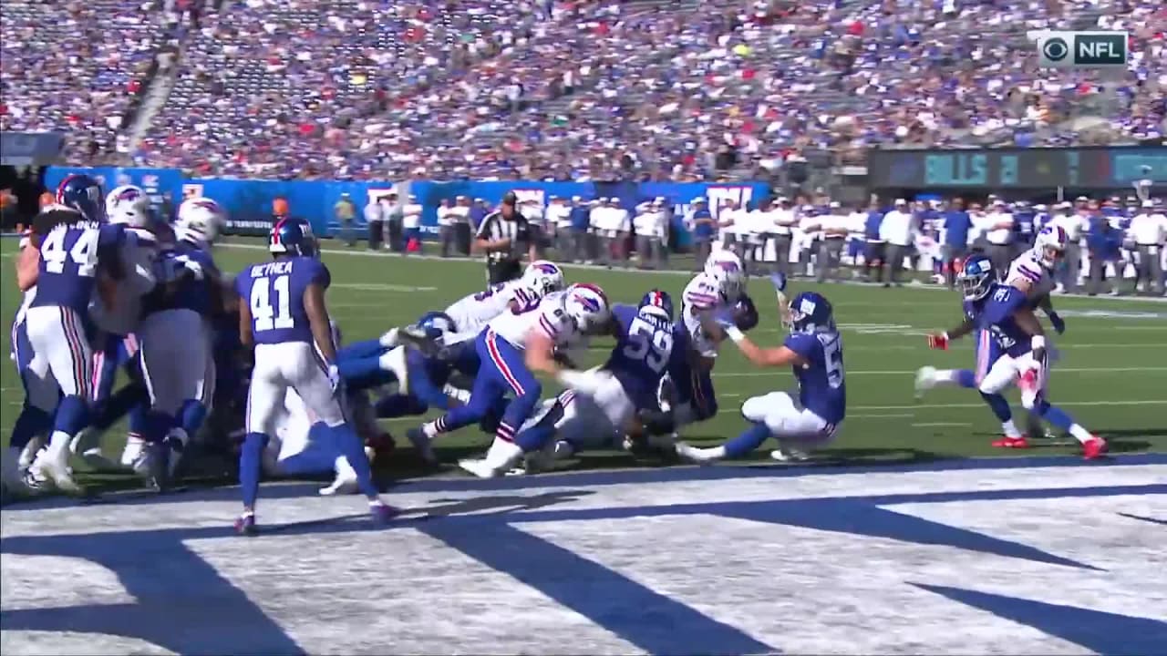 Buffalo Bills wide receiver Frank Gore plunges into the end-zone for a 1  yard gain - Gold Medal Impressions