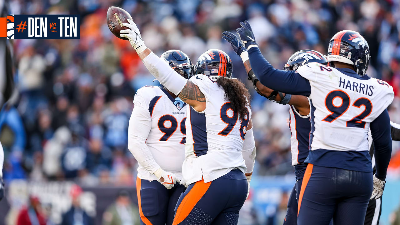 Denver Broncos defensive lineman Mike Purcell takes part in drills