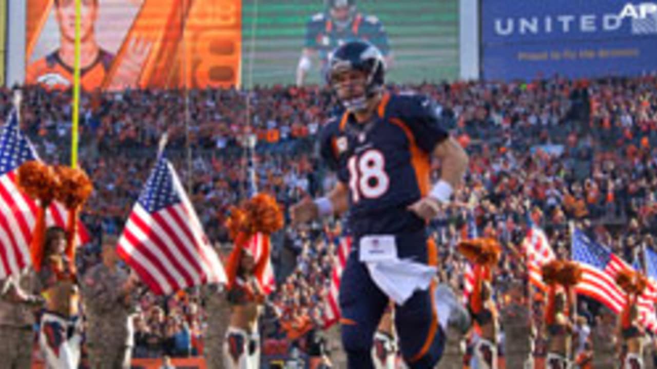 Peyton leads Broncos to top seed