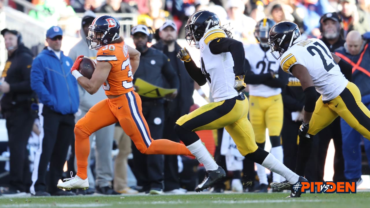 November 03, 2019: Denver Broncos running back Phillip Lindsay (30) is  congratulated during a timeout after his 16-yard sealed the win at the end  of the second half of the game between