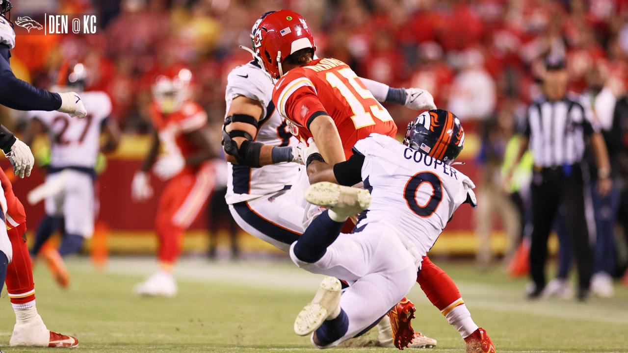 Denver Broncos linebacker Jonathon Cooper , left, and linebacker