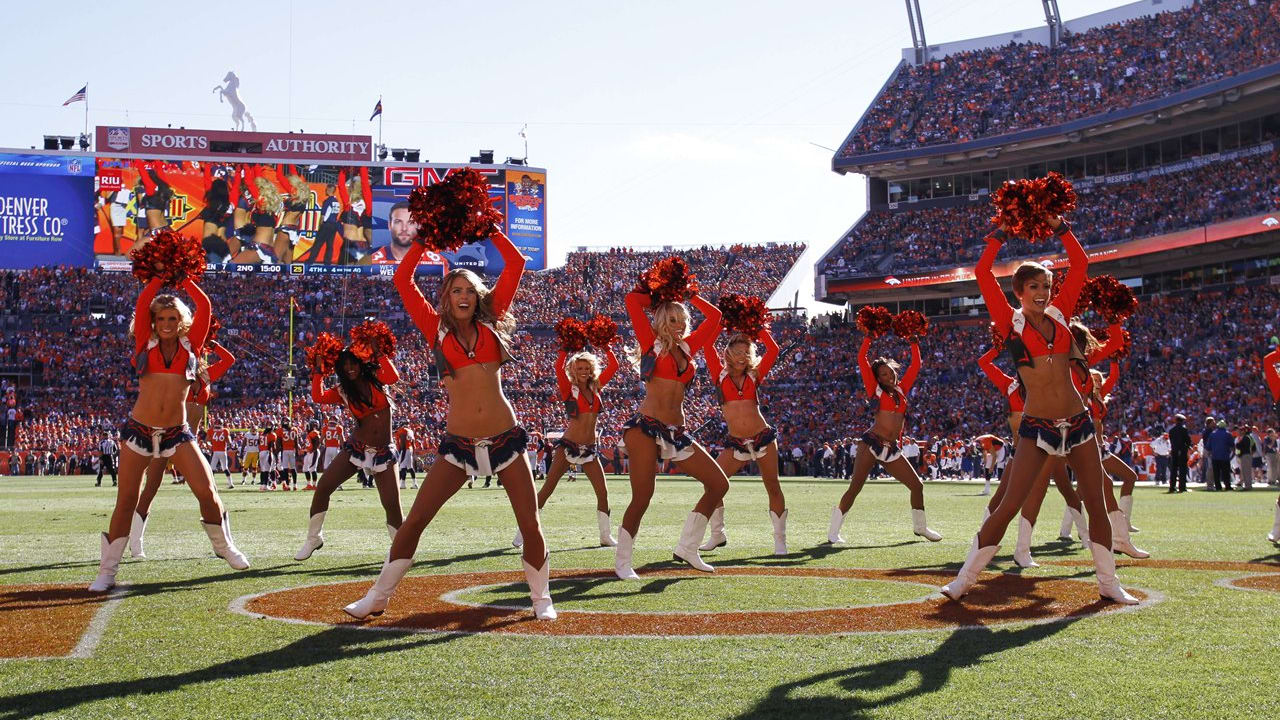 The Denver Broncos cheerleaders perform at Sports Authority Field