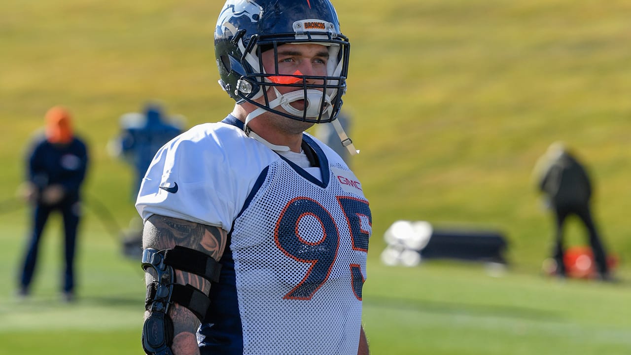 Denver Broncos defensive end Derek Wolfe honored