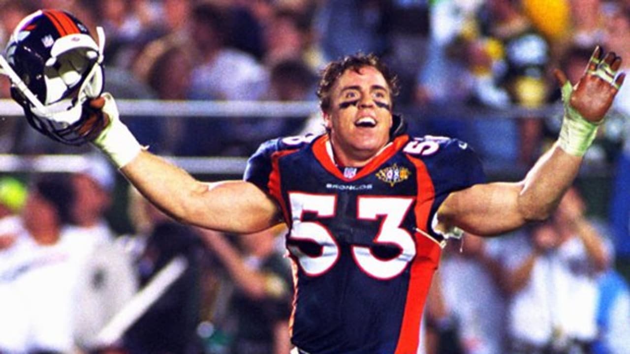 Former Denver Broncos defensive player Bill Romanowski looks on during a  halftime ceremony during an NFL football game between the Denver Broncos  and the Washington Commanders Sunday, Sept. 10, 2023, in Denver. (