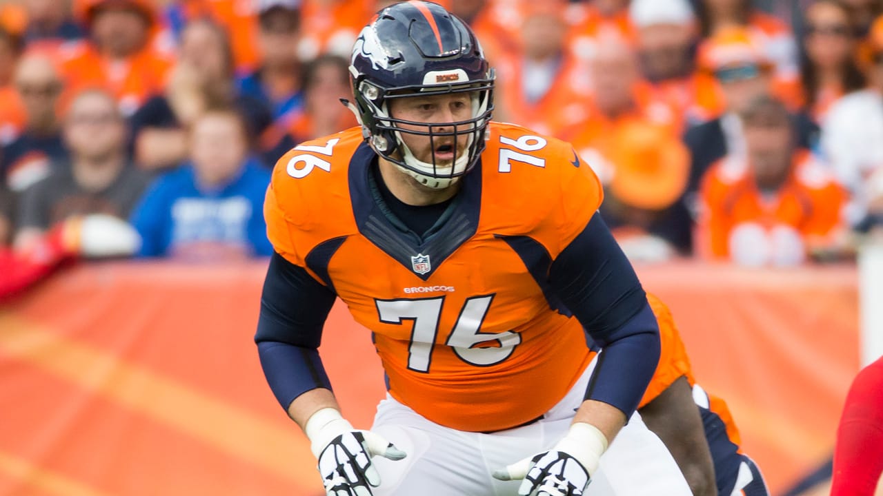 Denver Broncos tackle Tyler Polumbus takes part in drills during