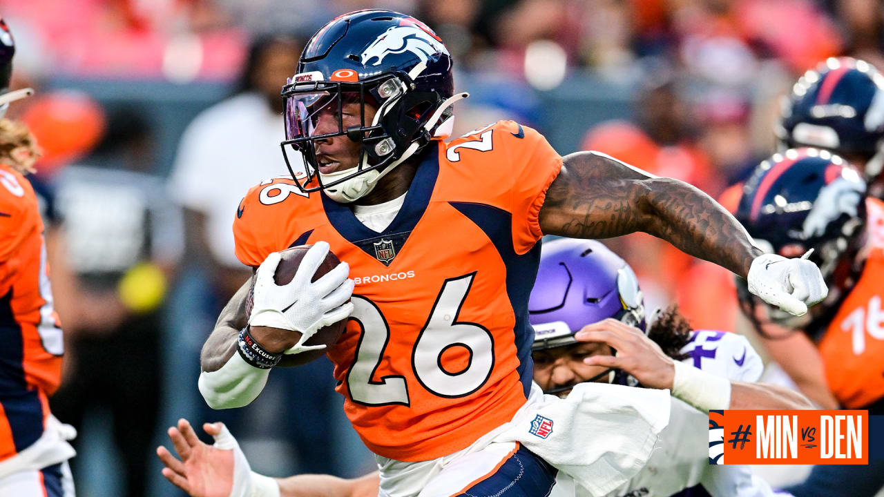 Denver Broncos running back Mike Boone (26) takes part in a drill at an NFL  organized