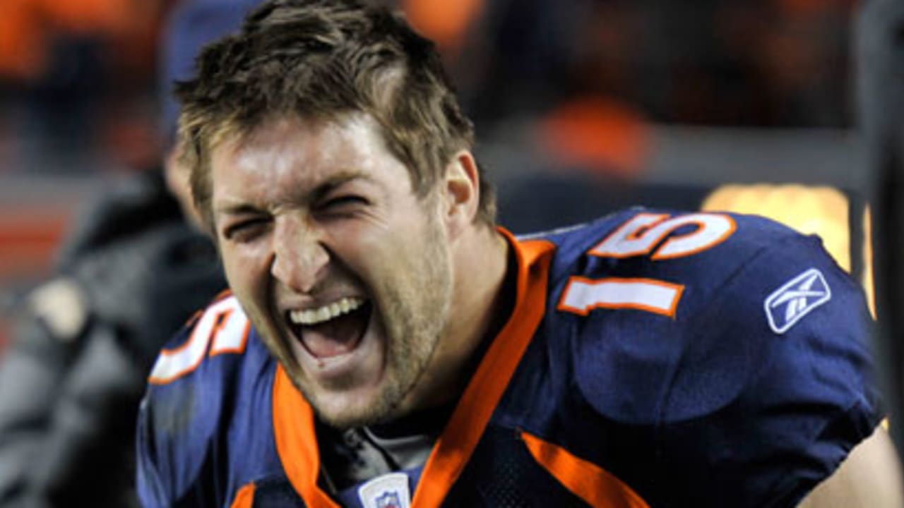 Jan. 8, 2012 - Denver, CO, USA - Denver Broncos QB TIM TEBOW runs for big  yardage against the Steelers during the 1st. half at Sports Authority Field  at Mile High Sunday