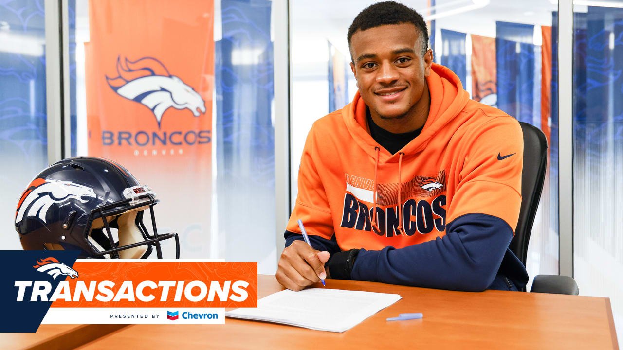 Patrick Surtain II signs his four-year contract with the Denver