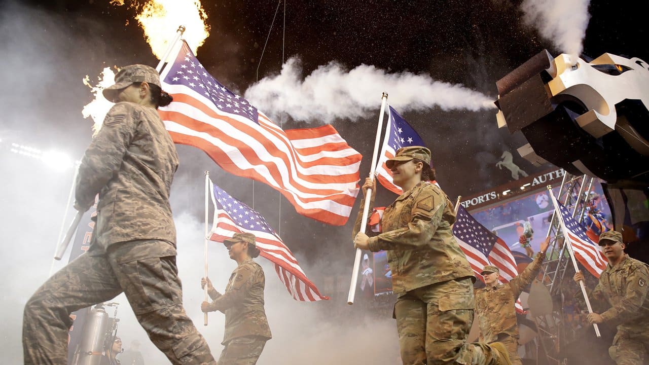 Shots of the Game Broncos celebrate Salute to Service