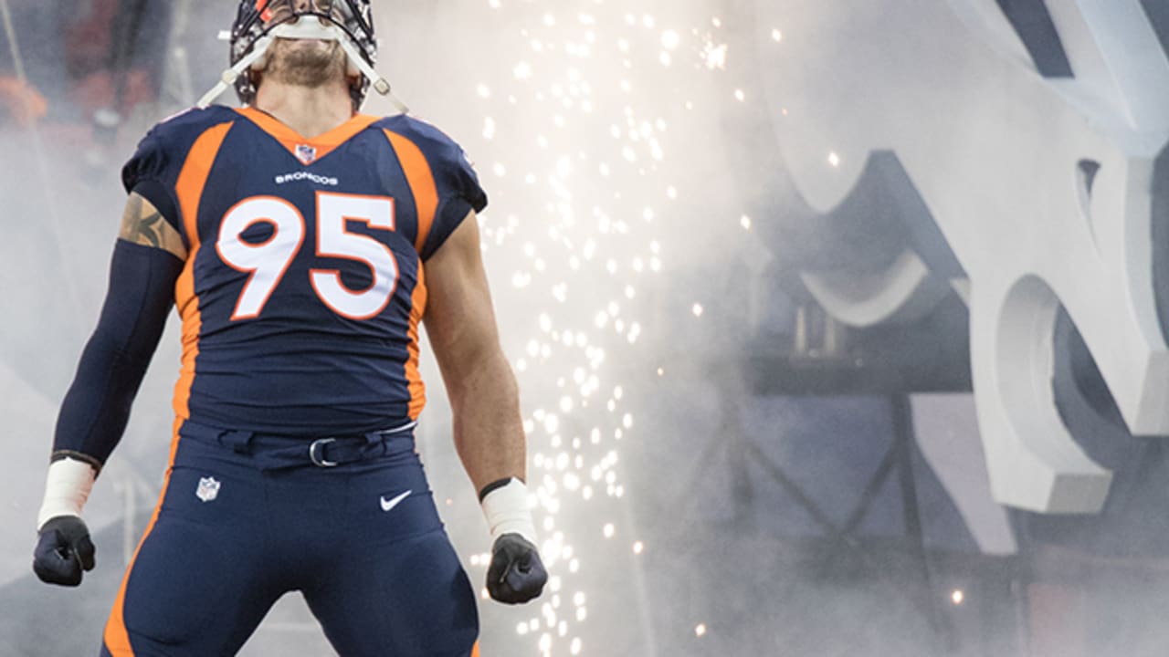 Denver Broncos defensive end Derek Wolfe honored