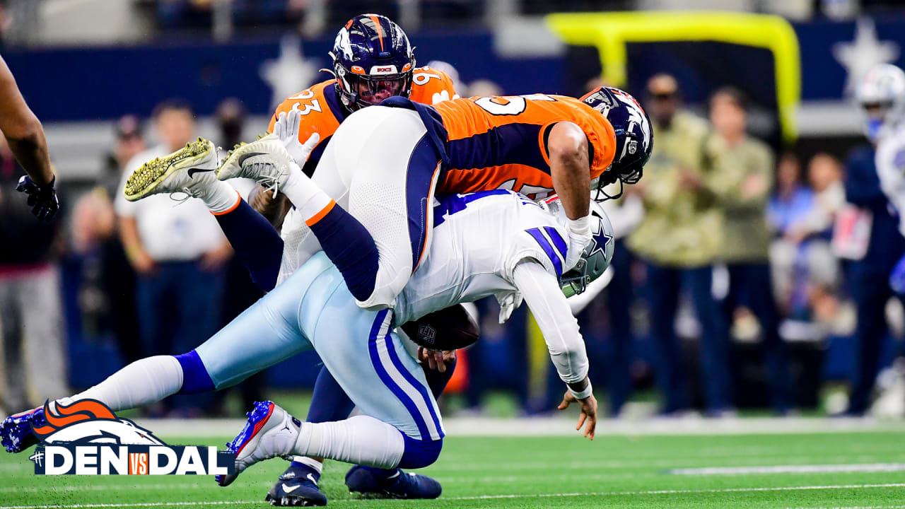 Denver Broncos linebacker Jonathon Cooper finishes off Washington