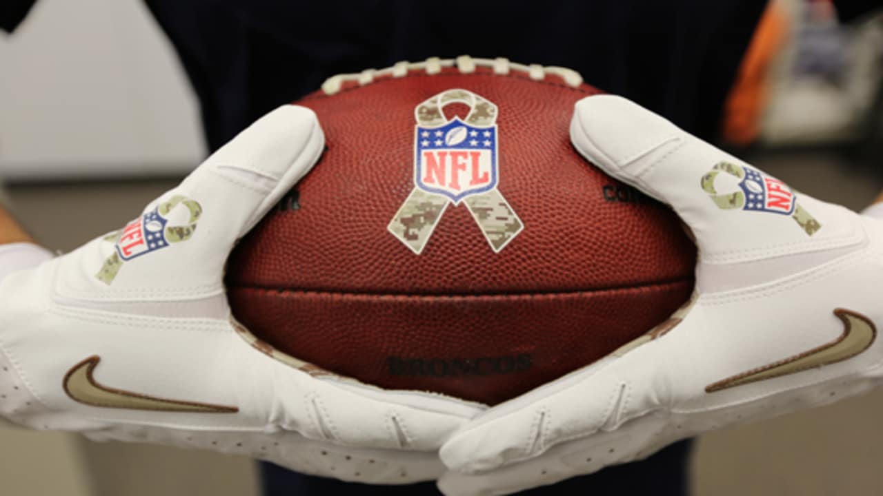 A Salute to Service towel is shown before an NFL football game