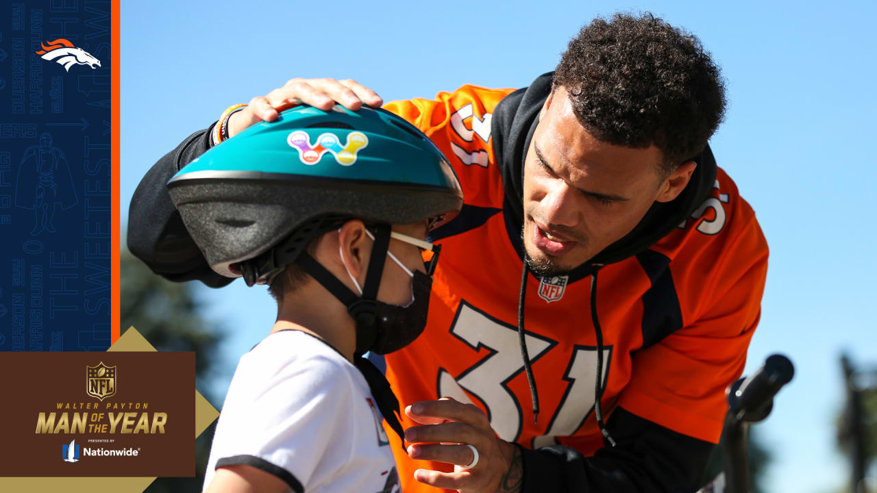 Broncos build bikes for local youth in honor of former coach