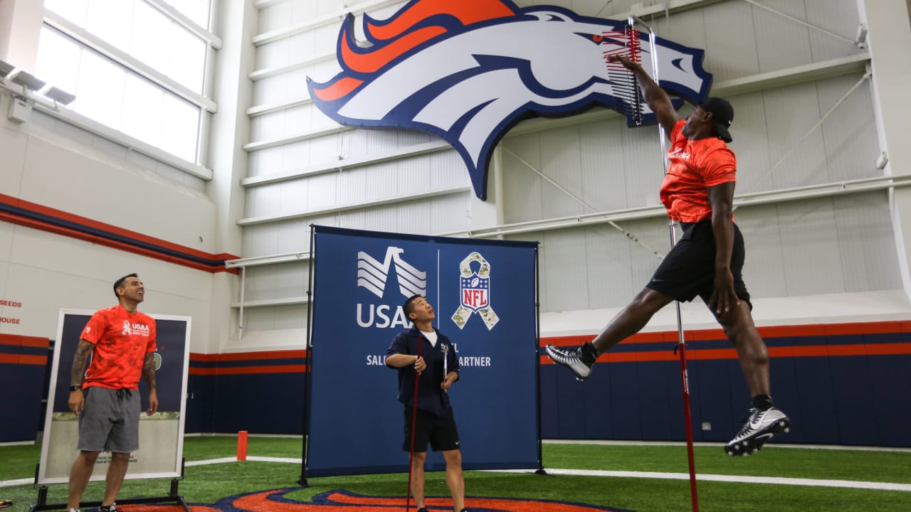 Military members take part in USAA's Salute to Service NFL Boot Camp