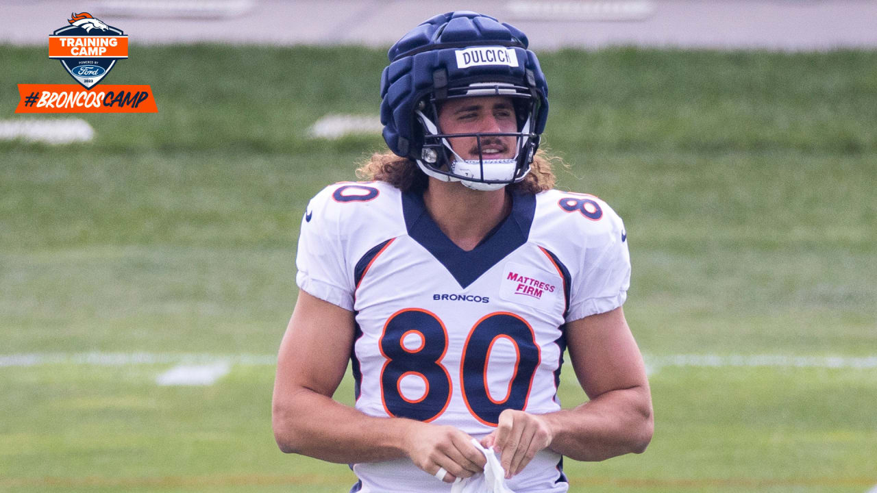 Denver Broncos tight end Greg Dulcich runs drills during practice