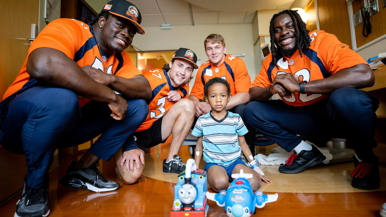 Photos Broncos rookie visit with kids and families at Children's Hospital Colorado