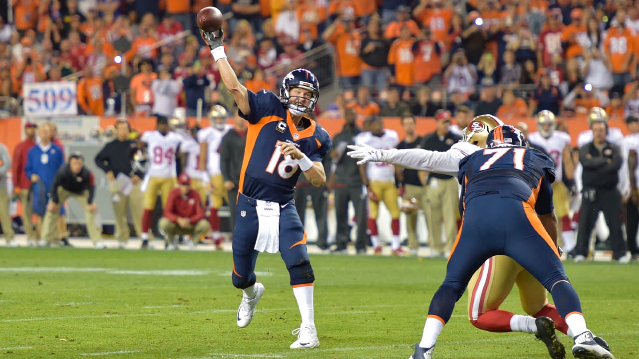 Denver Broncos quarterback Payton Manning scores a second quarter touchdown  against the Dallas Cowboys game at AT&T Stadium in Arlington, Texas on  October 6, 2013. UPI/Ian Halperin Stock Photo - Alamy