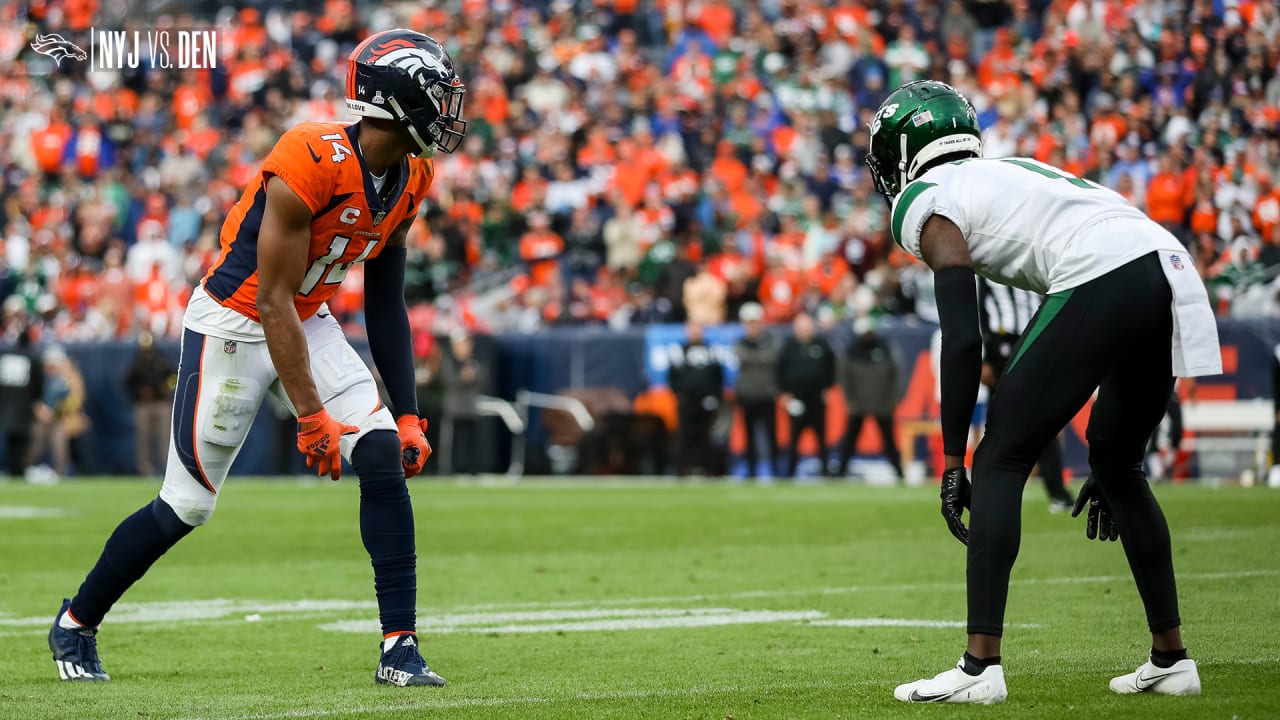 Denver Broncos orange-blue stripe uniform combo returns vs Titans