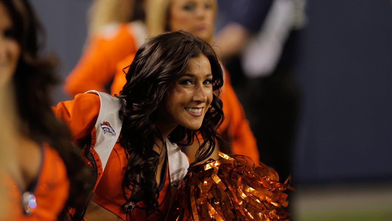 A Houston Texans cheerleader wearing a salute to service uniform