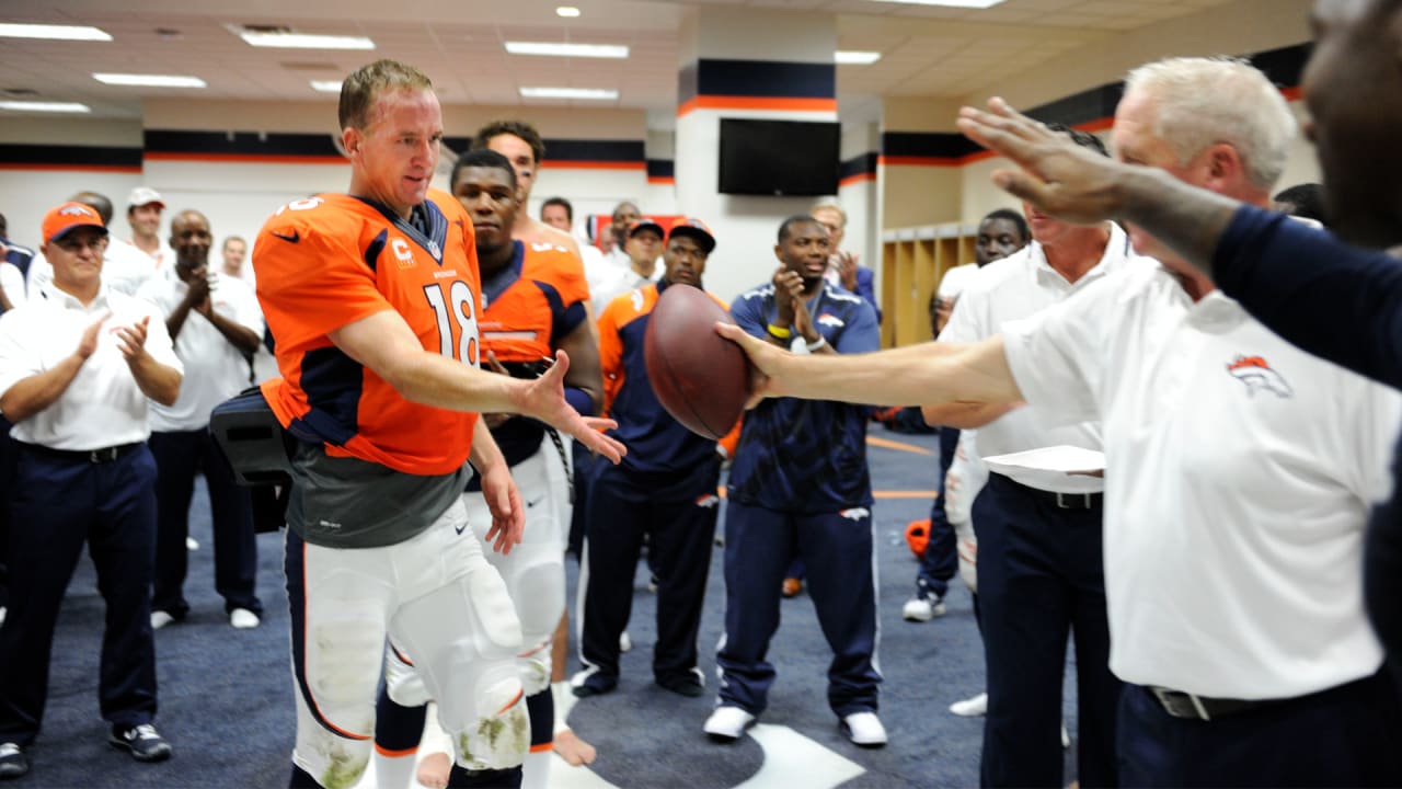 Manning throws 7 TDs as Broncos stampede past defending champion Ravens