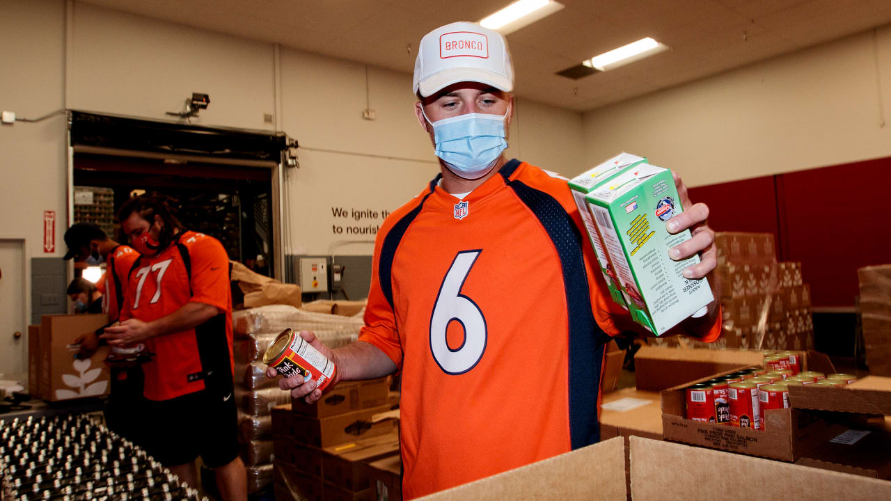 Broncos visit Food Bank of the Rockies to help package supplies