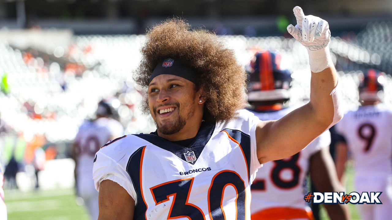 Denver Broncos running back Phillip Lindsay (30) takes part in drills  during the opening day of the team's NFL football training camp Thursday,  July 18, 2019, in Englewood, Colo. (AP Photo/David Zalubowski