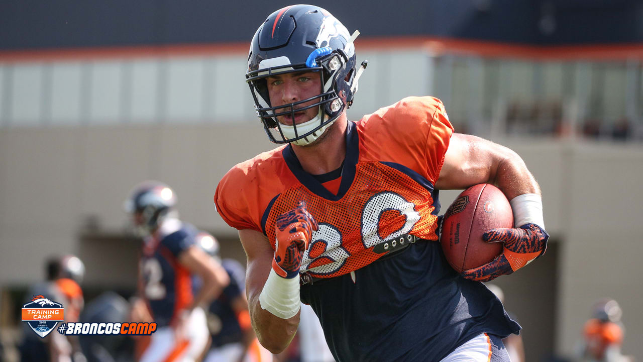 Denver Broncos tight end Jake Butt (80) takes part in drills