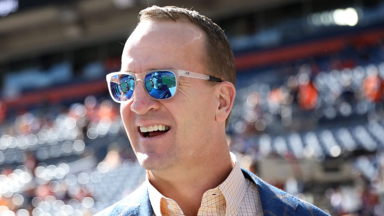 Peyton Manning enters Pro Football Hall of Fame with jokes, tears