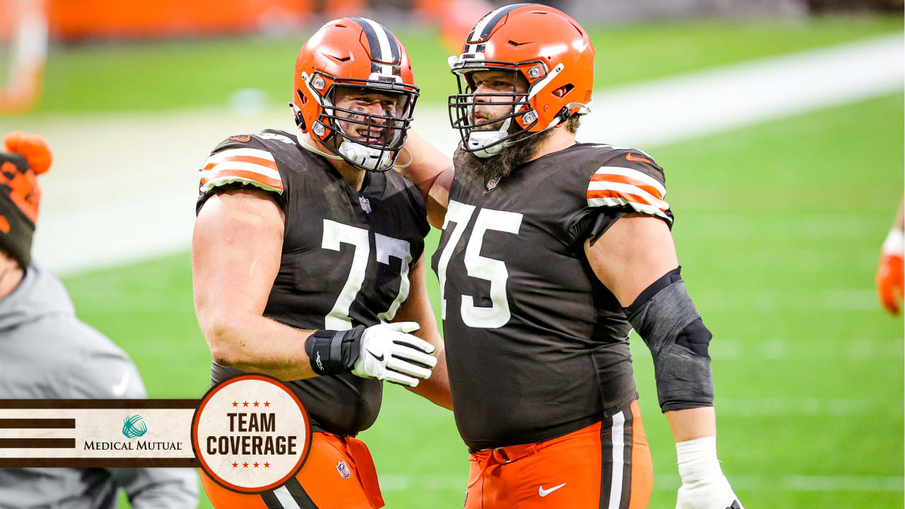 Joel Bitonio and 2 Cleveland Browns w/ down stock vs.Miami Dolphins