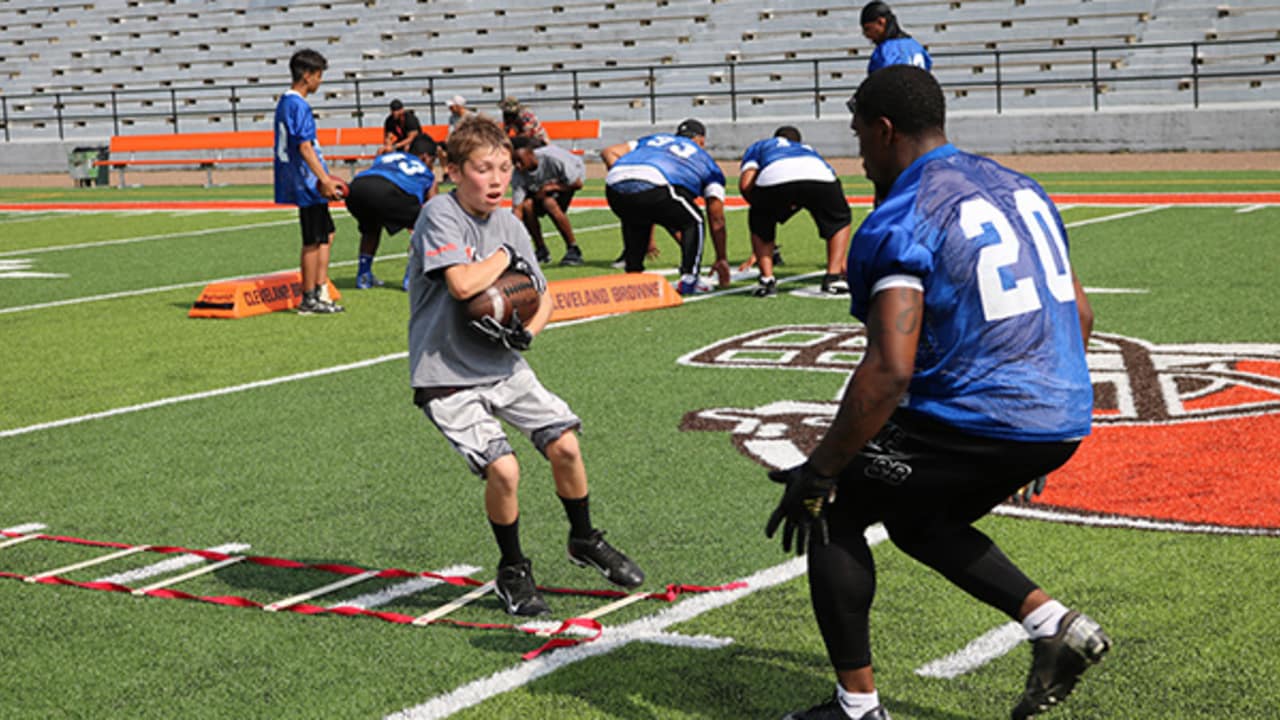 Rhodes Football Gives Back