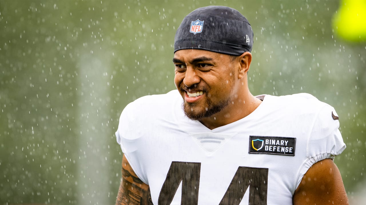 Jacksonville Jaguars center Nick Ford (77) looks at the video screen from  the sidelines during the second half of an NFL preseason football game  against the Cleveland Browns, Friday, Aug. 12, 2022