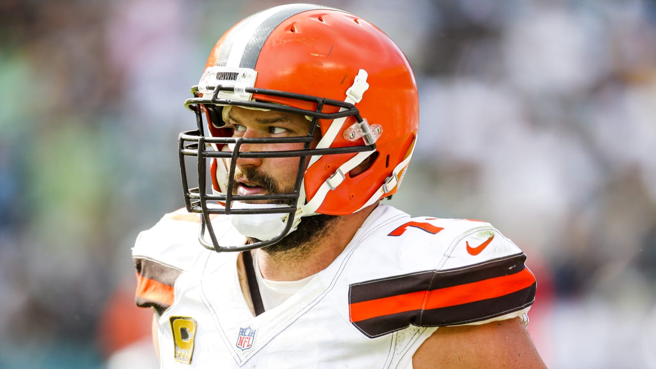 This Sunday, Oct. 22, 2017, photo shows Cleveland Browns tackle Joe Thomas  leaving the field after getting hurt in the second half of an NFL football  game against the Tennessee Titans, in