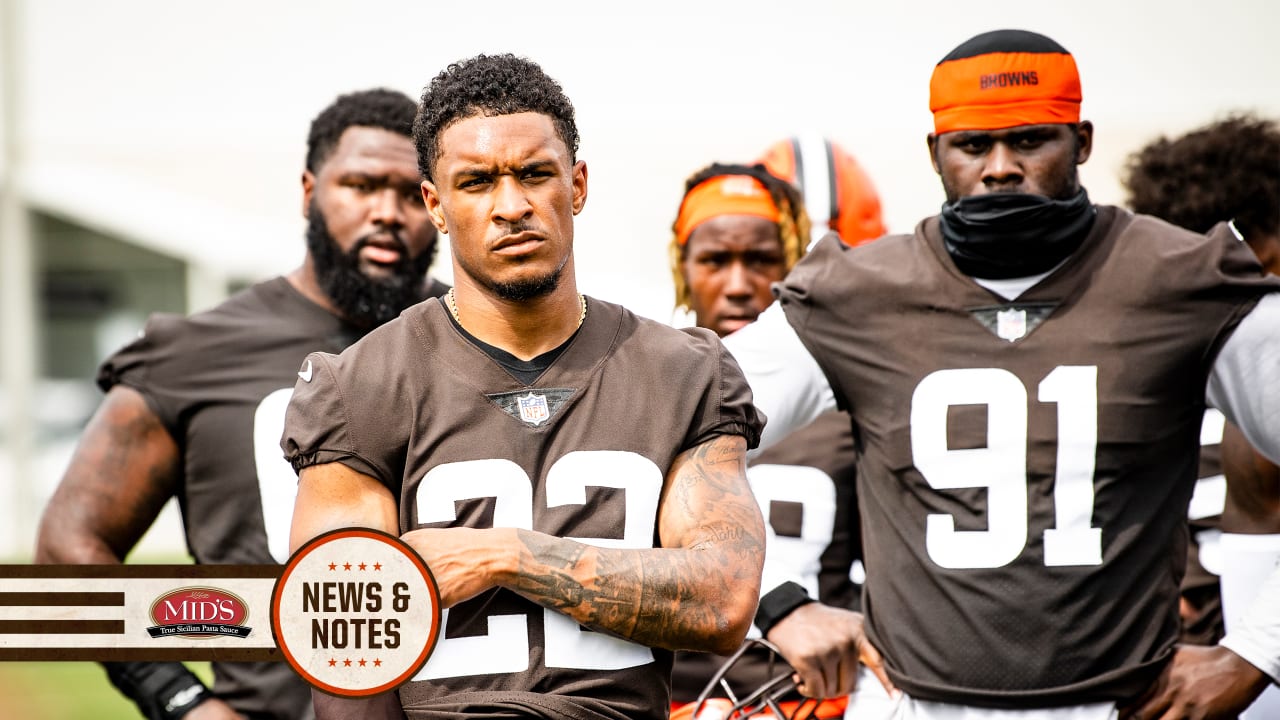 Cleveland Browns defensive tackle Malik Jackson (97) and defensive end  Myles Garrett (95) walk off the field after an NFL football game against  the Denver Broncos, Thursday, Oct. 21, 2021, in Cleveland.