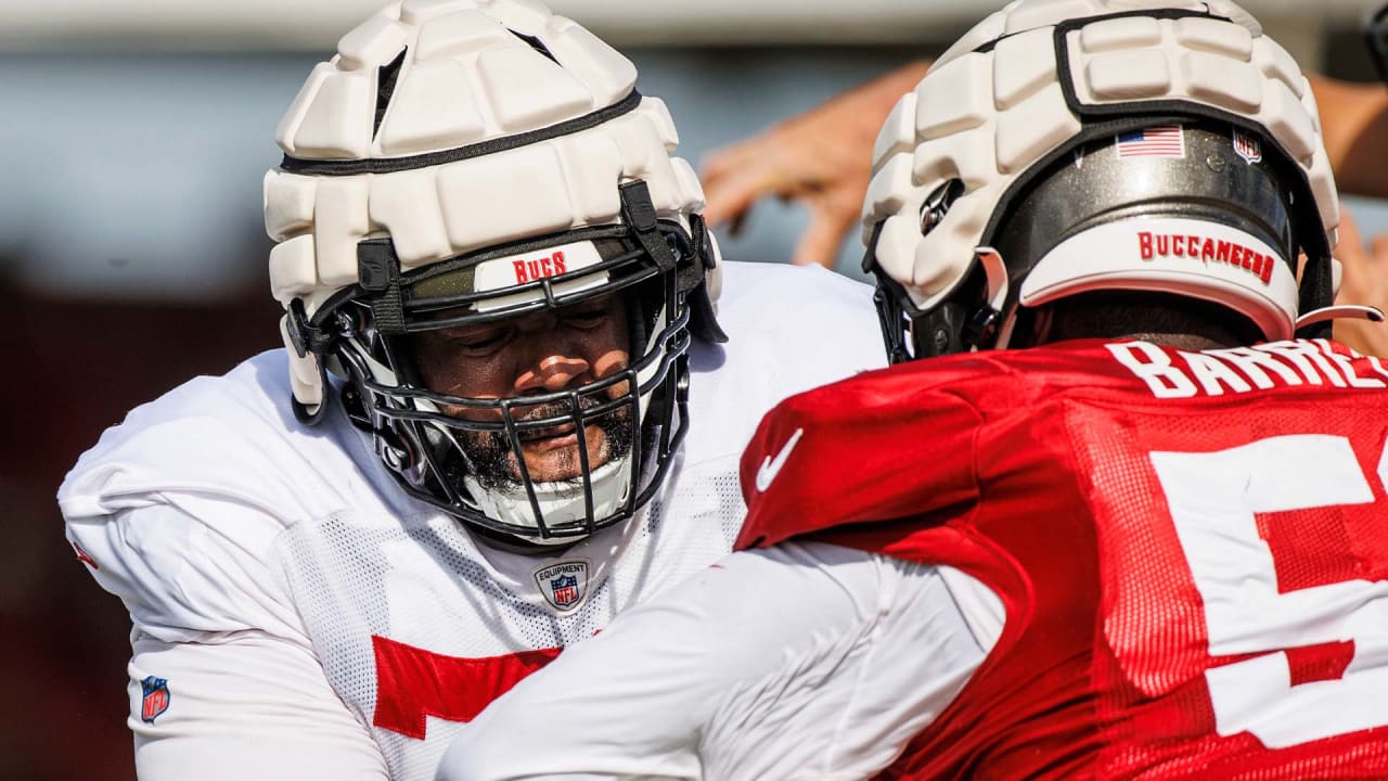 Tampa Bay Buccaneers guard Luke Goedeke (67) prepares to make a block  during the second half of an NFL football game against the Minnesota  Vikings, Sunday, Sept. 10, 2023, in Minneapolis. (AP