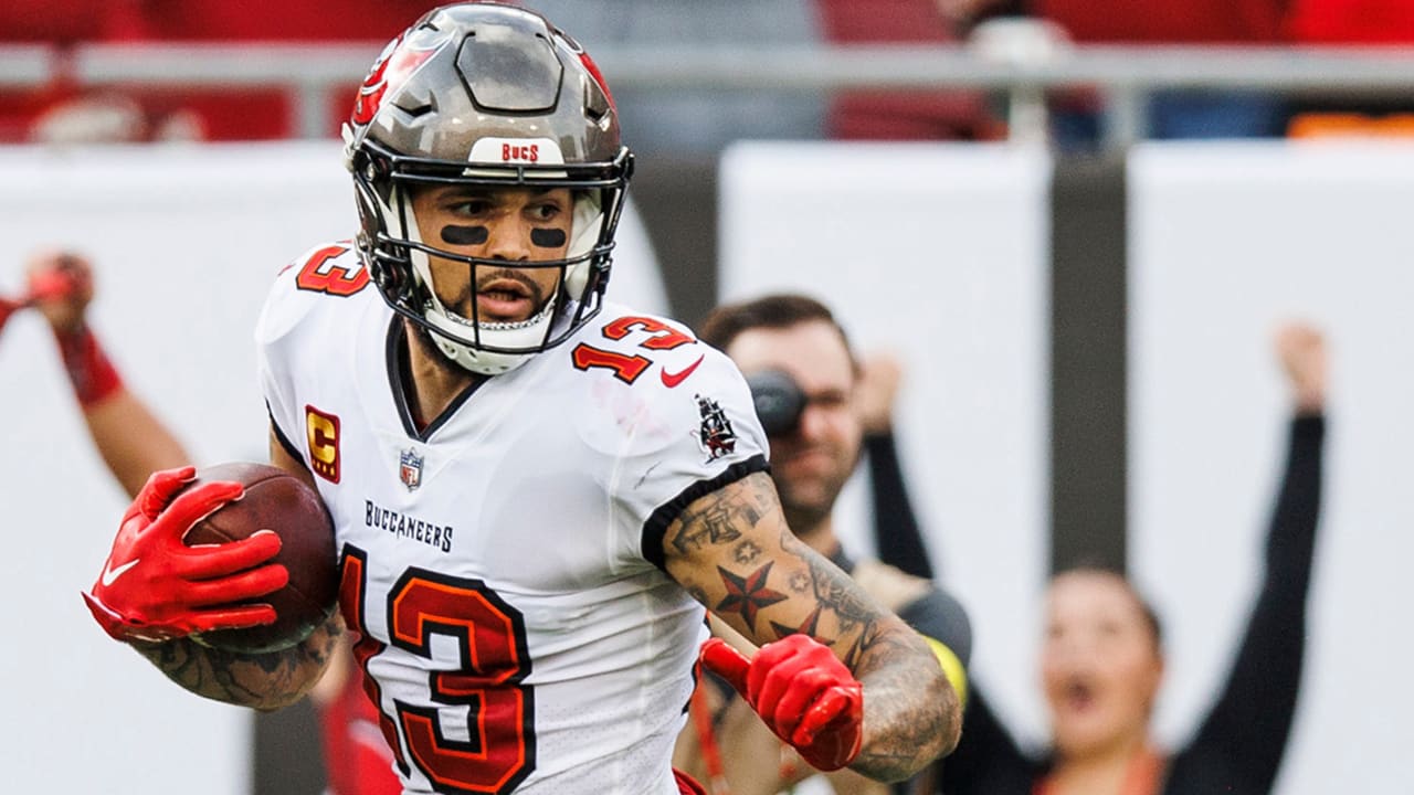 Tampa Bay Buccaneers wide receiver Mike Evans (13) points to a fan after  catching a touchdown pass during an NFL football game against the Chicago  Bears, Sunday, Sept. 17, 2023, in Tampa