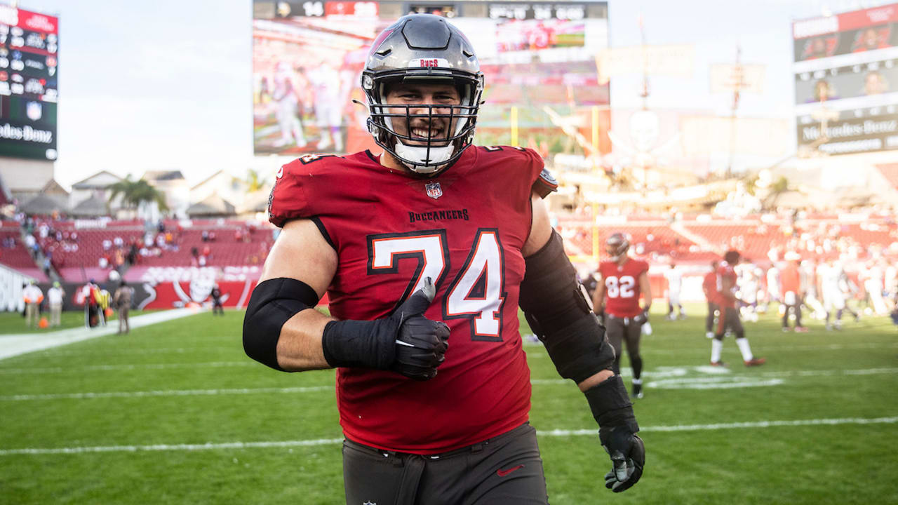 Tampa Bay Buccaneers guard John Molchon (75) walks to the locker