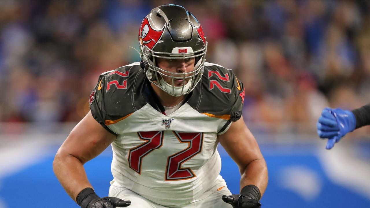 Tampa Bay Buccaneers offensive tackle Josh Wells (72) leaves the field  after a preseason NFL football game against the Tennessee Titans, Saturday,  Aug. 21, 2021, in Tampa, Fla. (AP Photo/Phelan M. Ebenhack