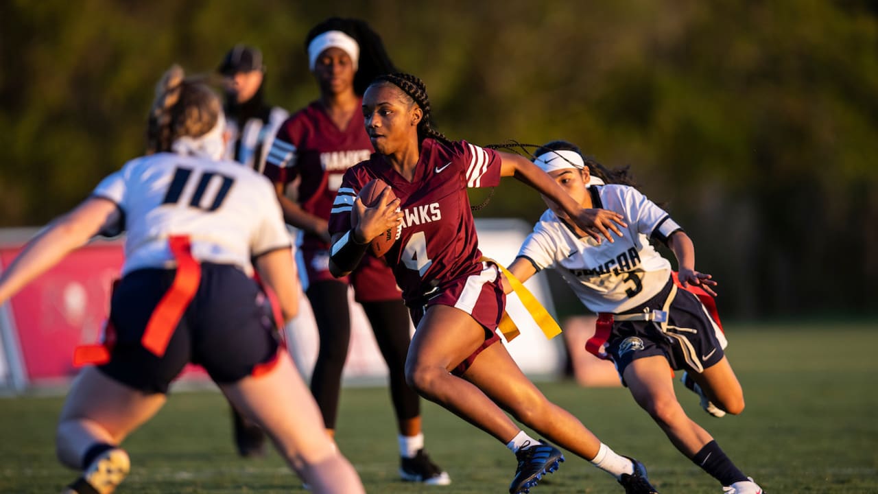 Woman becomes first flag football player with gear in Pro Football Hall of  Fame