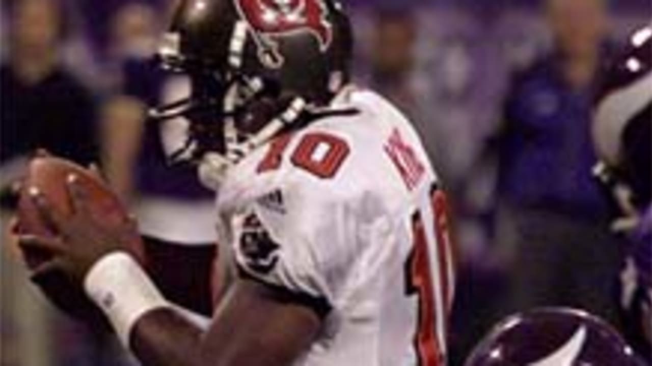 Minnesota Vikings - Cris Carter and Randy Moss on the sidelines during a  game in 1999.