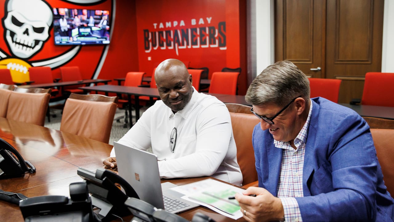 Tampa Bay Buccaneers General Manager Jason Licht talks on the phone News  Photo - Getty Images