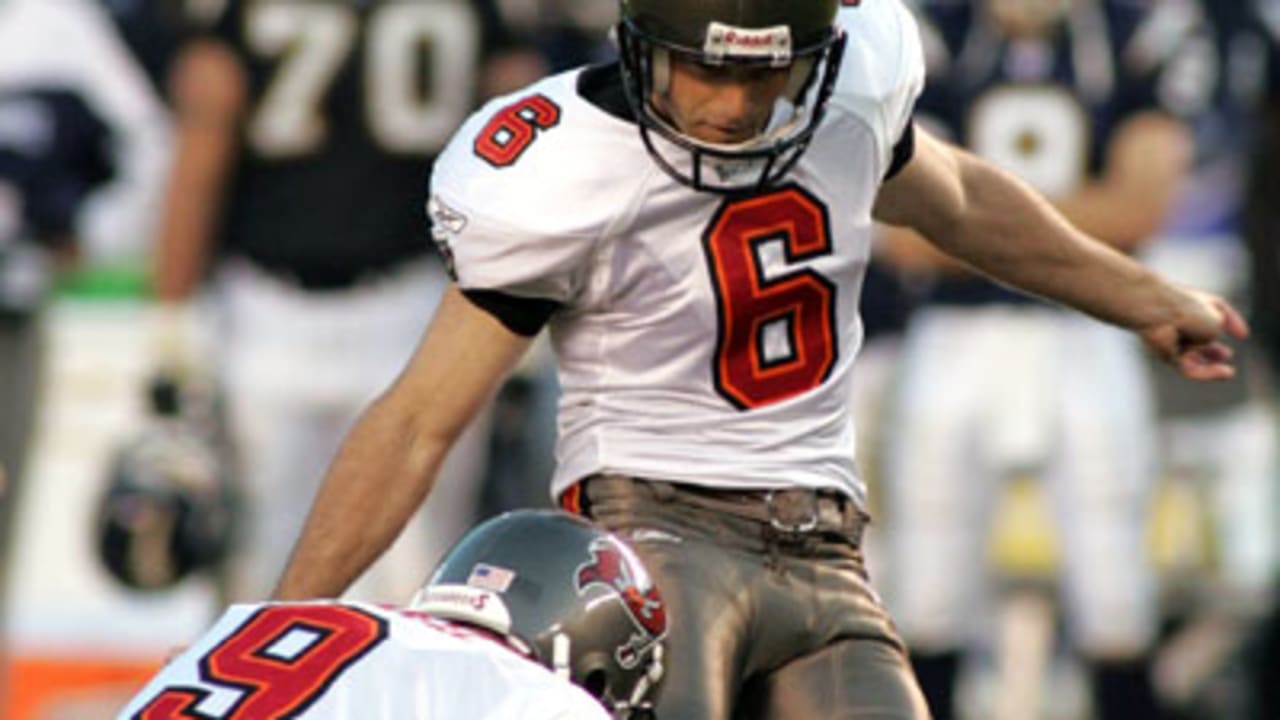 Tampa Bay Buccaneers' Jay Taylor (6) watches a replay as he played in his  first NFL game replacing Martin Gramatica, the franchise's all-time leading  scorer. Taylor made good in his first-game opportunity