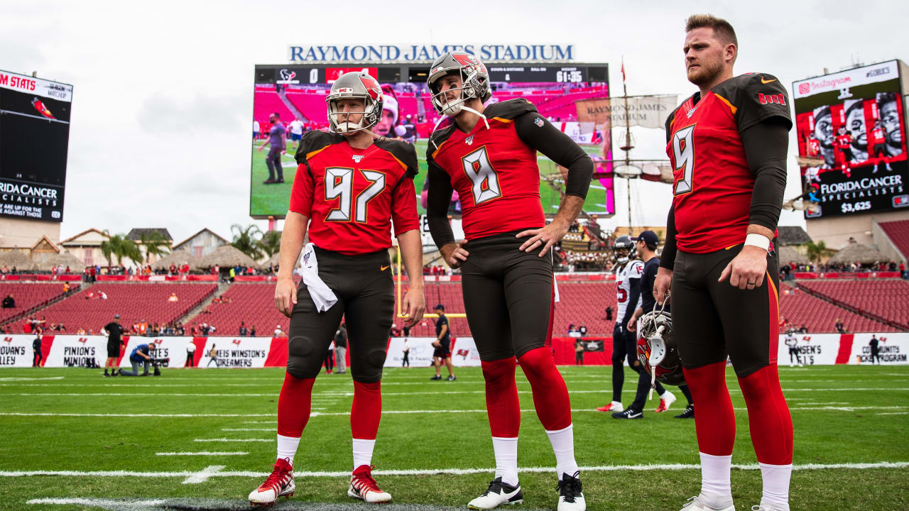 Tampa Bay Buccaneers punter Bradley Pinion (8) kicks the ball away