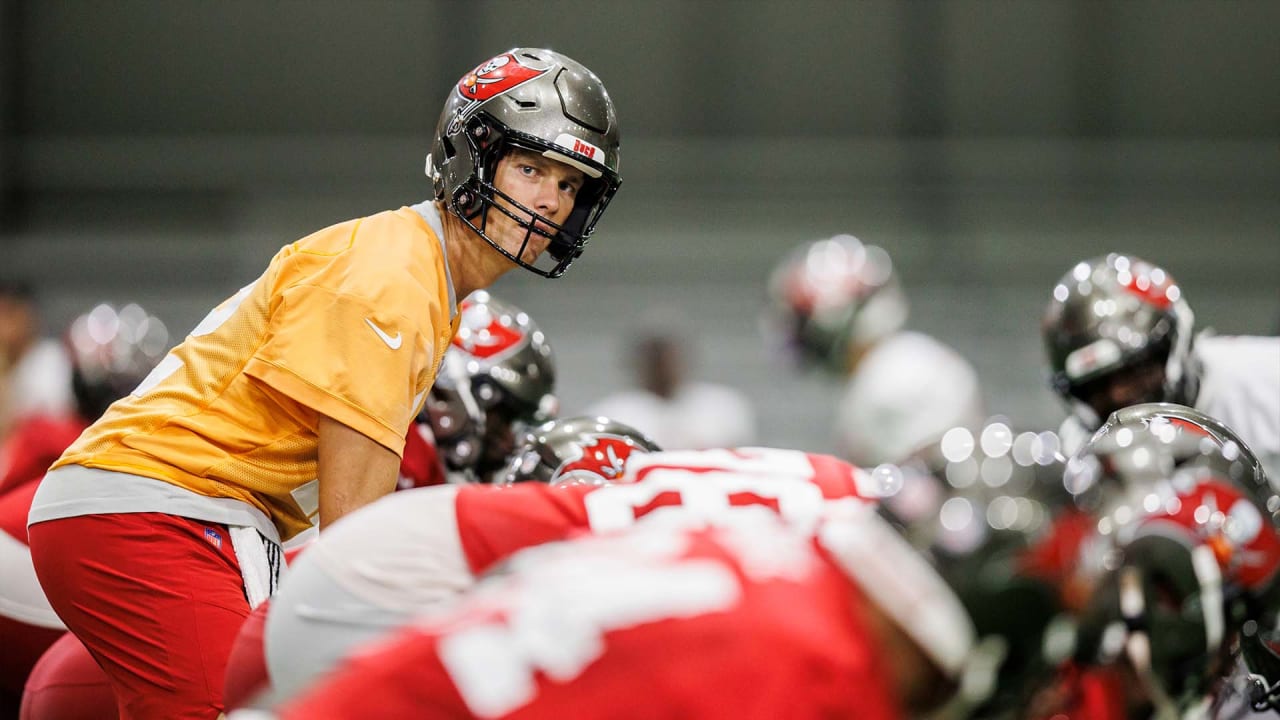 Tampa Bay Buccaneers quarterback Tom Brady (12) throws a pass as offensive  guard Alex Cappa (65 …