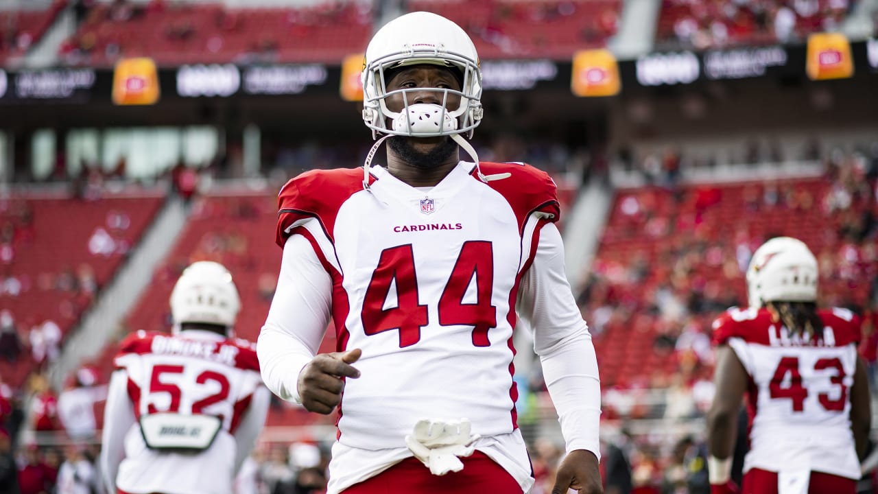 Greg Dortch of the Arizona Cardinals avoids a tackle after making