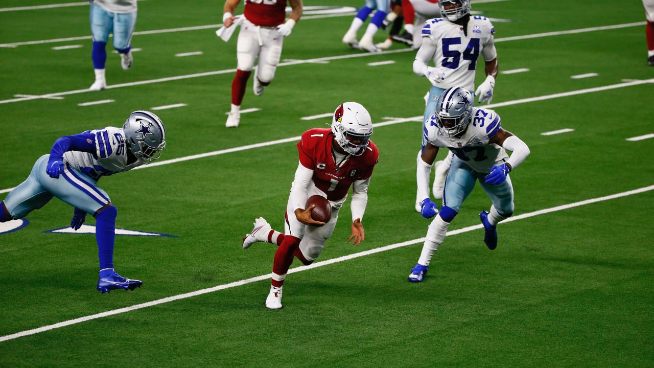 Dallas Cowboys' and Denver Broncos' kickers and other special-teams  players warm up prior to a National Football League game at the Cowboys'  home field AT&T Stadium in Arlington, Texas