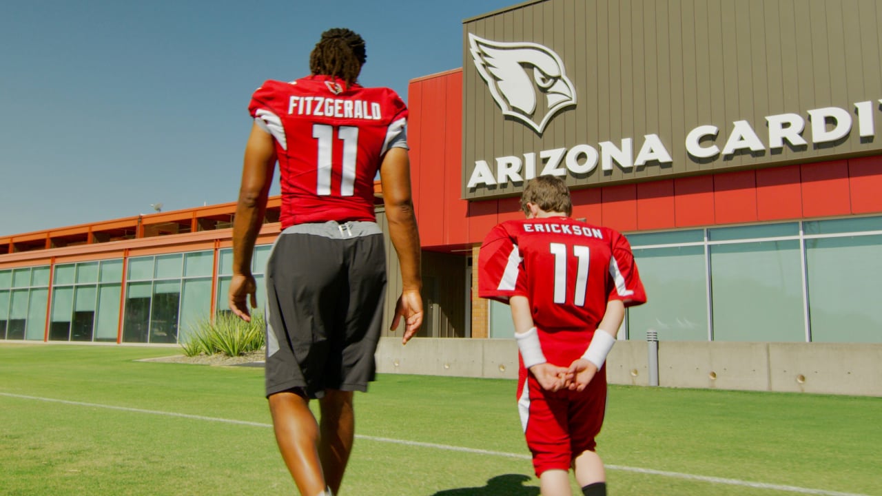 LARRY FITZGERALD AND SON TAKE IN A GAME